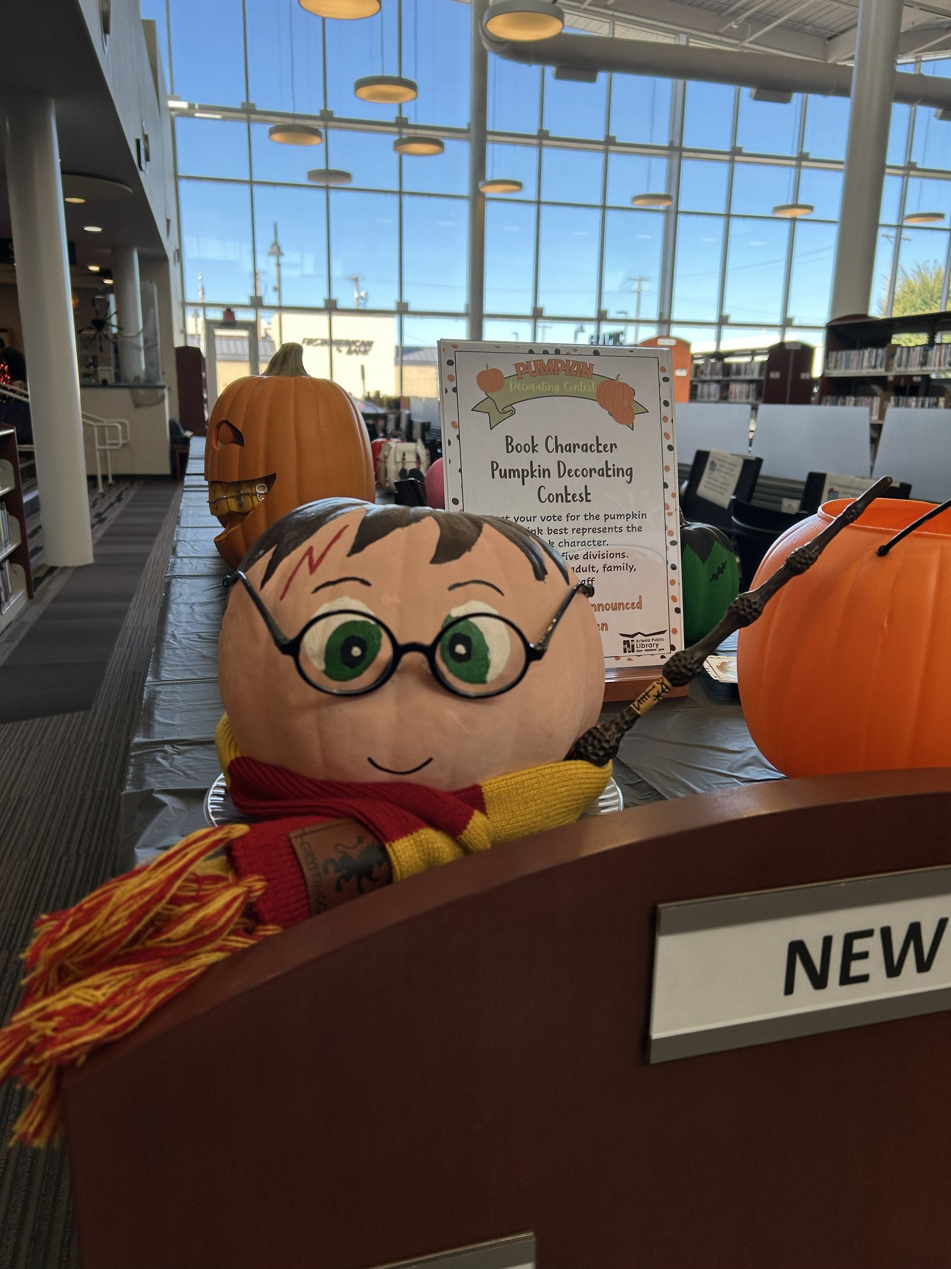 A pumpkin painted to look like Harry Potter
