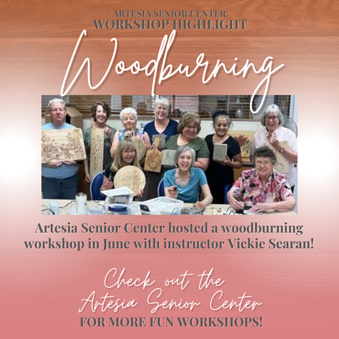  Seniors hold up artwork created at the woodburning workshop held at the 