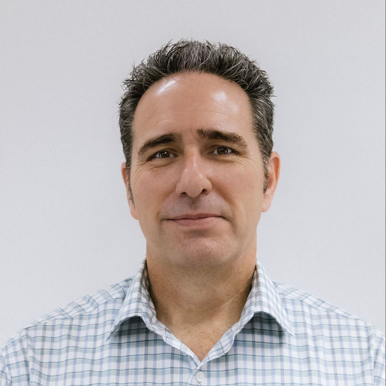 Councilor Wade Nelson photographed in front of white background